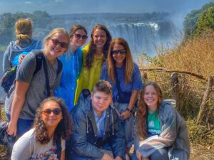 Jamie Harris with students at Victoria Falls