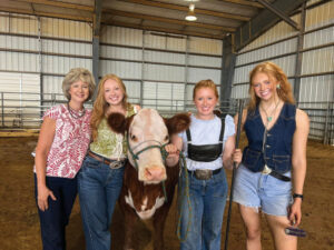 Caroline Garrell comes from an active 4-H and cattle-showing family.