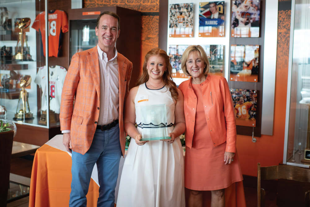 Peyton Manning, Caroline Garrell and UT chancellor Donde Plowman during the Haslam Scholarship awards program.